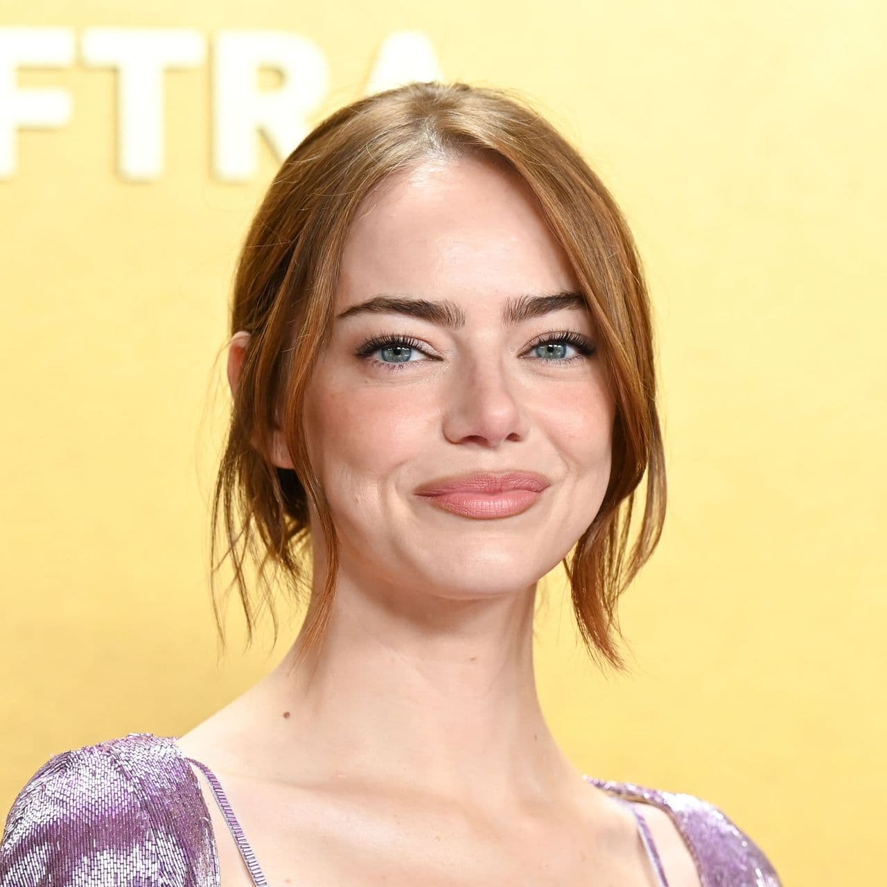 Why Emma Stone's Red Carpet Cardigan Is Dividing the Internet, Explained by a Fashion Editor